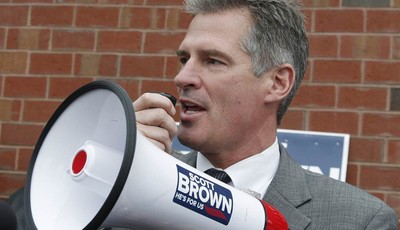 
              FILE - In this Oct. 24, 2012, file photo, then-Sen. Scott Brown, R-Mass., uses a bull horn at a campaign stop in Watertown, Mass. Three years ago, Brown was a little-known Republican st